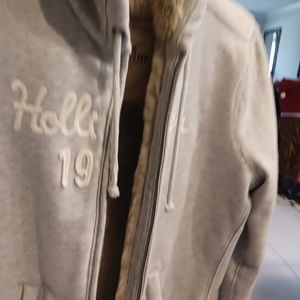Hollister fur lined zip up hoodie. Brand new